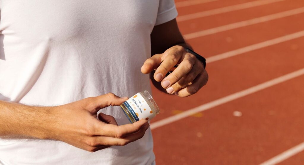 athlete using cbd pain relief cream uk