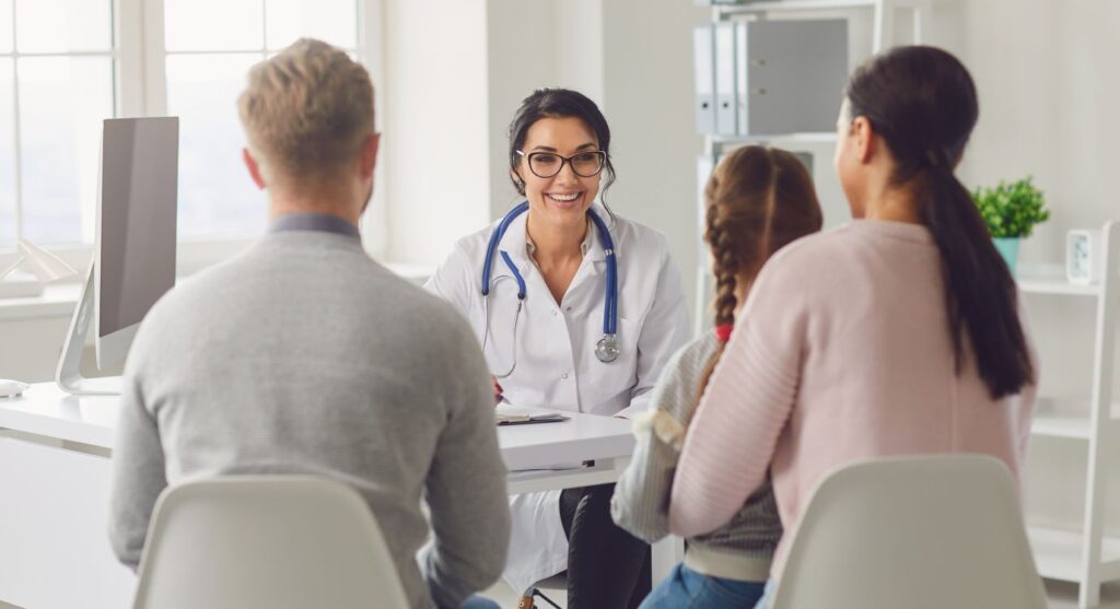 Parents speaking to a doctor about CBD oil for kids